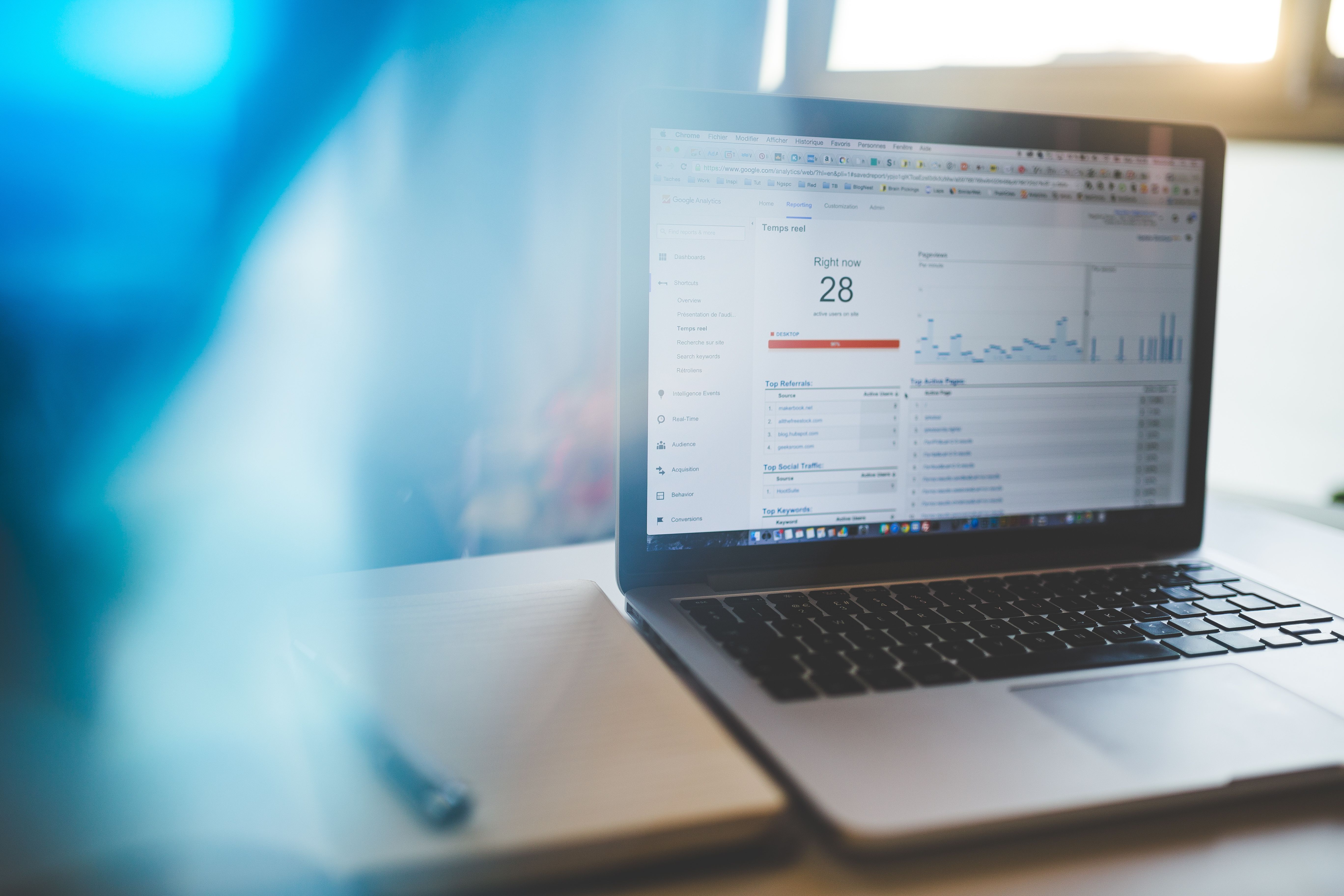 Laptop displaying Google Analytics dashboard for tracking website traffic and SEO performance