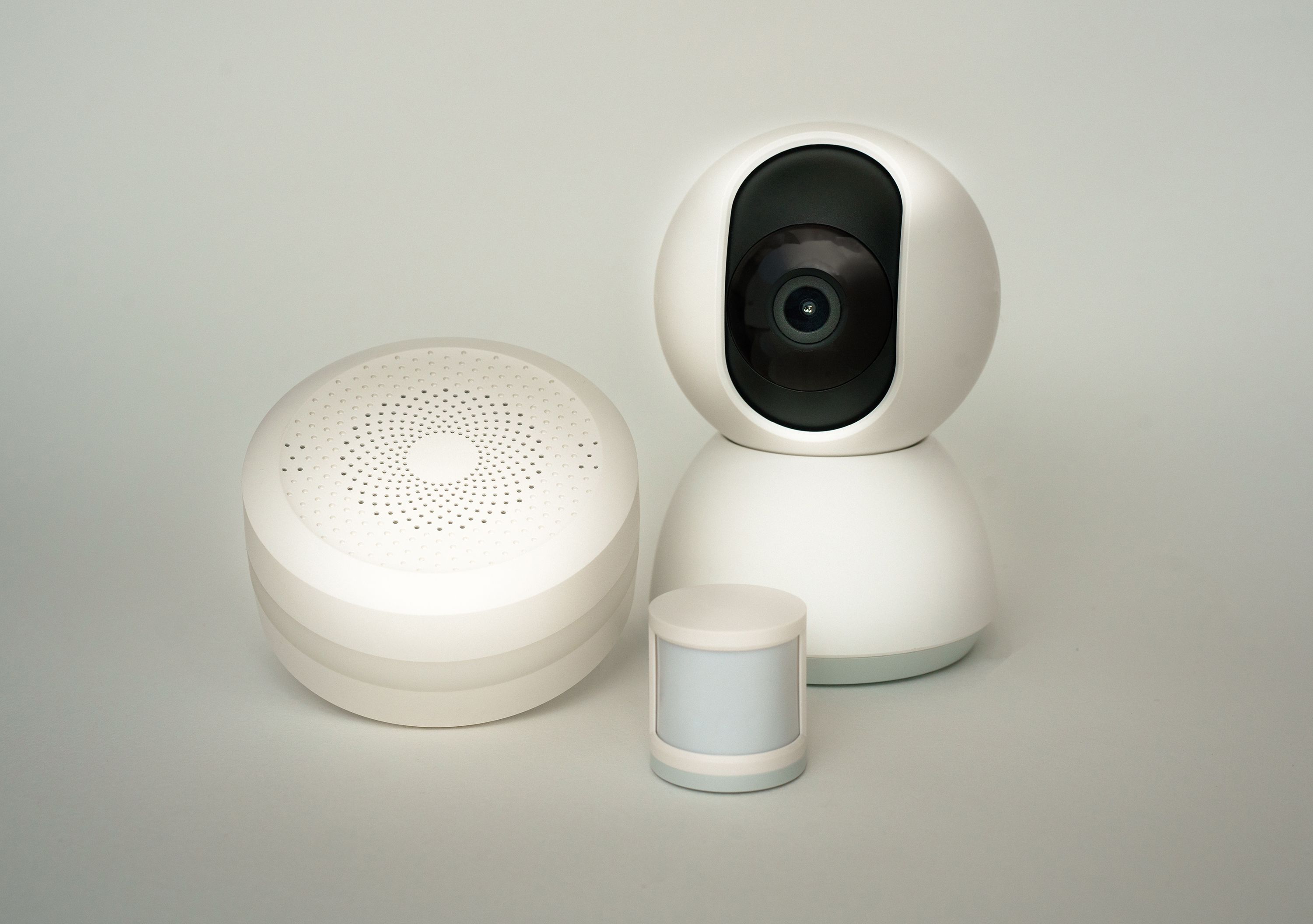Modern smart home security devices including a camera and sensors